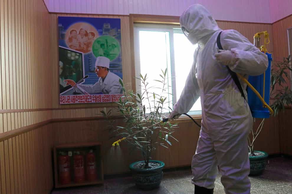 North Korea has announced its first coronavirus infection more than two years into the pandemic as leader Kim Jong Un called for raising Covid-19 preventive measures to maximum levels (Jon Chol Jin/AP, File)