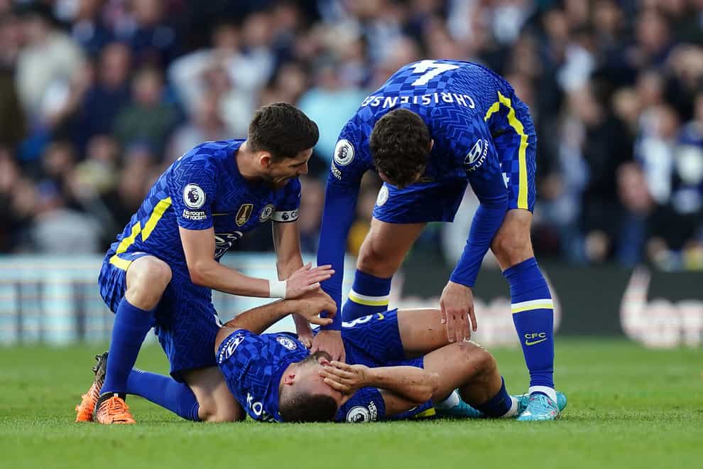 Mateo Kovacic, centre, reacts after being injured by Dan James’ tackle in Wednesday’s Premier League clash with Leeds (Mike Egerton/PA)