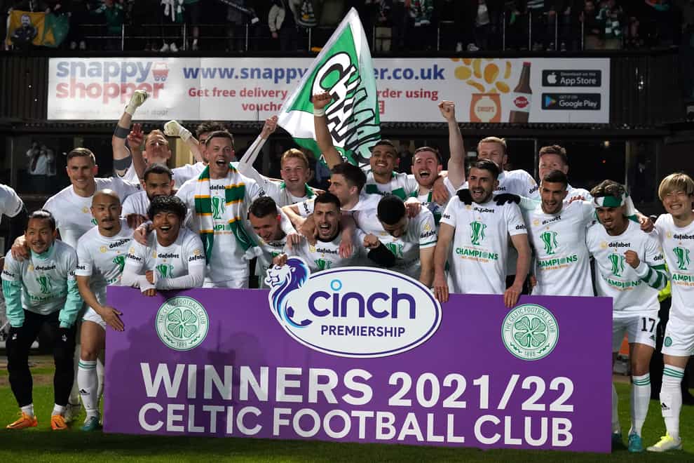 Celtic celebrate title victory at Tannadice (Andrew Milligan/PA)