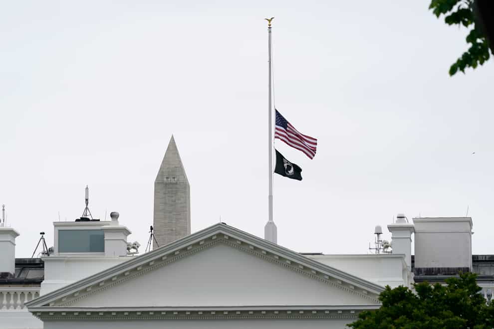 The American flag flies at half-mast at the White House (Susan Walsh/AP)