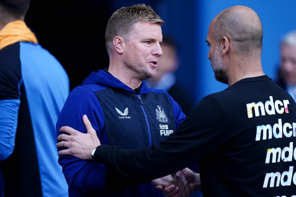 Newcastle head coach Eddie Howe (left) admits his team has a gap to close on the likes of Pep Guardiola’s Manchester City (Martin Rickett/PA)