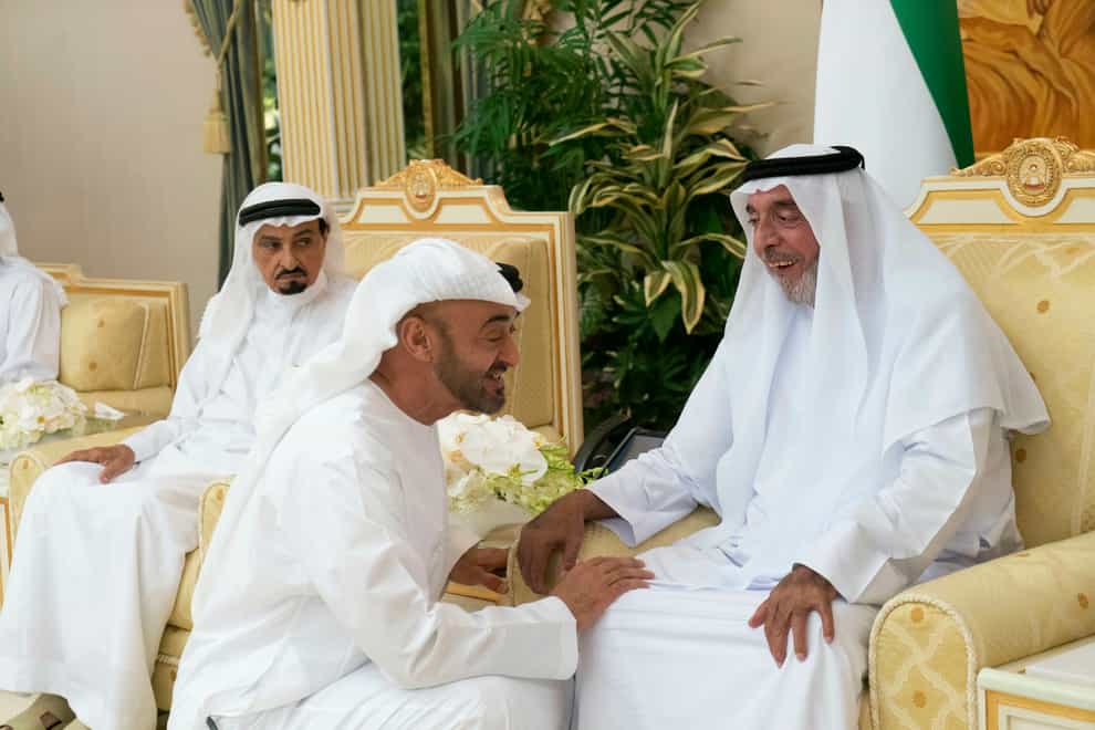 Sheikh Khalifa bin Zayed Al Nahyan being greeted by Sheikh Mohammed bin Zayed Al Nahyan (Rashed al-Mansoori/Ministry of Presidential Affairs via AP, File)