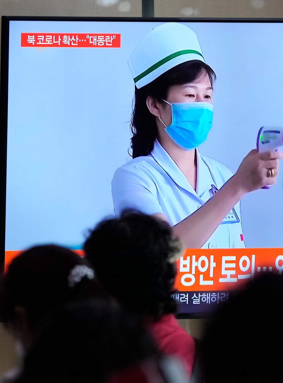 North Korea has confirmed 15 more deaths and hundreds of thousands of additional patients with fevers as it mobilises more than a million health and other workers to try to suppress the country’s first Covid-19 outbreak (Ahn Young-joon/AP)