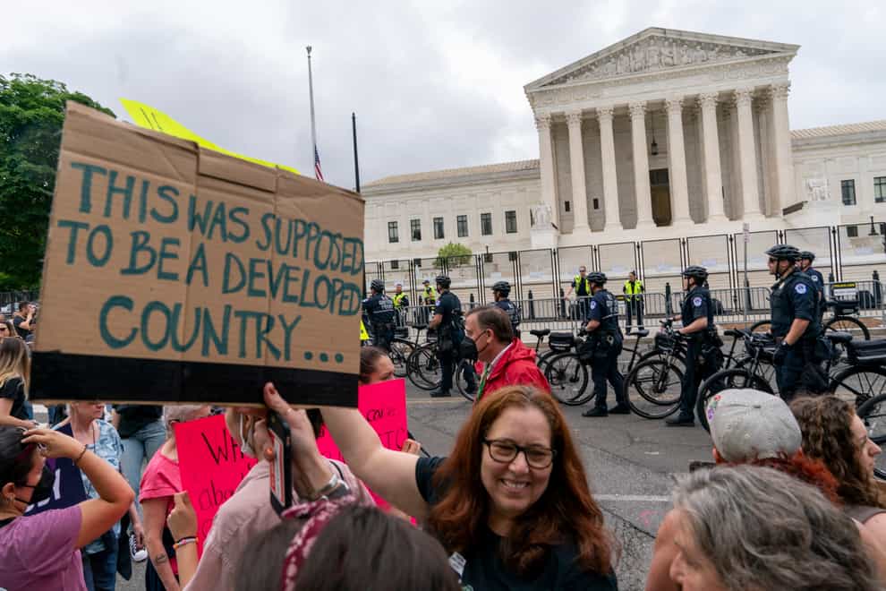 Pro-choice campaigners protest outside the Supreme Court in Washington as part of nationwide demos (Jacquelyn Martin/AP)