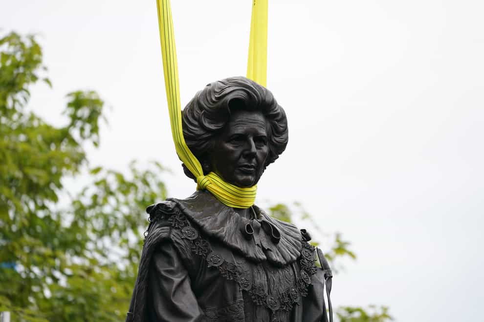 A statue of Baroness Margaret Thatcher is lowered into place in her home town of Grantham, Lincolnshire. Picture date: Sunday May 15, 2022.