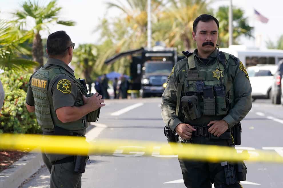 A man opened fire at a southern California church on Sunday, killing one person and injuring several others before being stopped and tied-up by parishioners in what an official called an act of ‘exceptional heroism and bravery’ (Damian Dovarganes/AP)