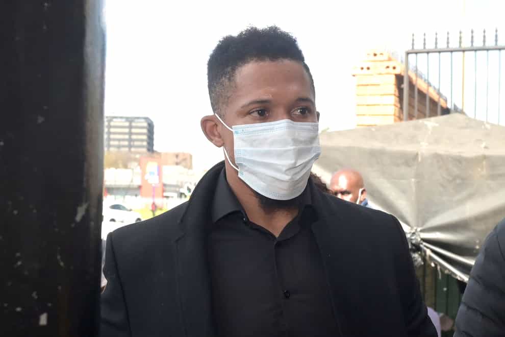 South Africa rugby player Elton Jantjies arrives at Kempton Park Magistrates’ Court in Johannesburg (AP)
