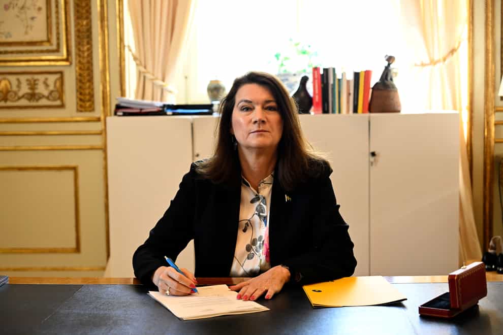 Swedish minister of foreign affairs Ann Linde signs Sweden’s application for Nato membership (Henrik Montgomery/TT News Agency via AP)