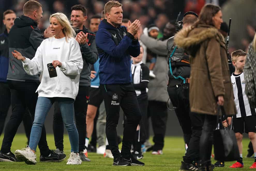 Eddie Howe was on the pitch with his Newcastle players, staff and their families after the win over Arsenal (Owen Humphreys/PA)