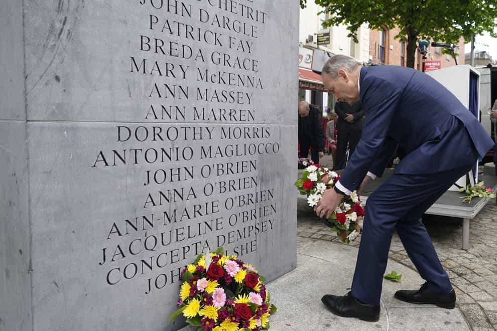 Taoiseach Micheal Martin lays a wreath in Dublin during a ceremony marking the 48th anniversary of the Dublin and Monaghan bombings (PA)