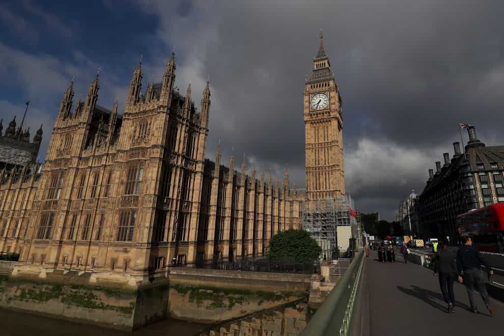 Storm clouds above the Palace of Westminster (Andrew Matthews/PA)