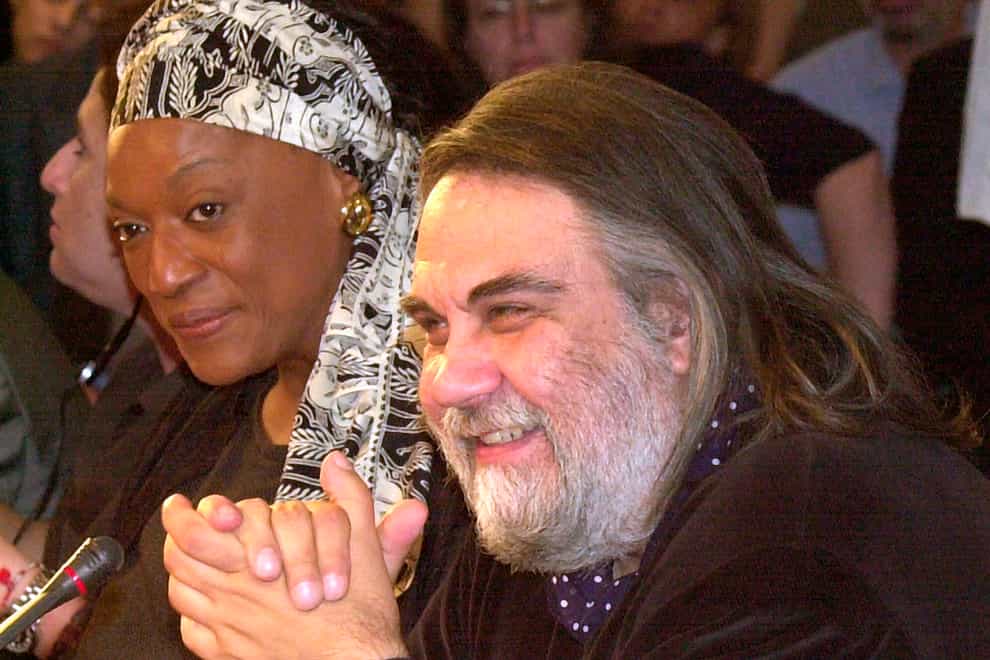 Composer Vangelis Papathanassiou, right, answers a question during a press conference in Athens, June 27, 2001. Vangelis, the Greece-born electronic composer who wrote the Academy Award-winning score for the film “Chariots of Fire” and music for dozens of other movies, documentaries and TV series, has died. He was 79. (Aris Messinis/AP Photo)