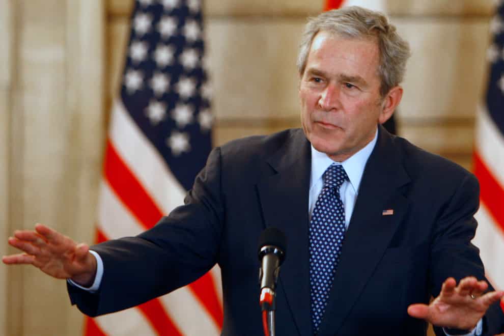 George W Bush launched the war on Iraq (Thaier al-Sudani/AP)