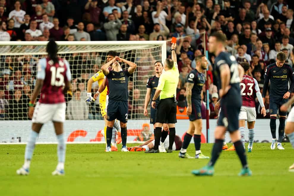 Burnley’s Matt Lowton reacts as he is shown a red card (Mike Egerton/PA)