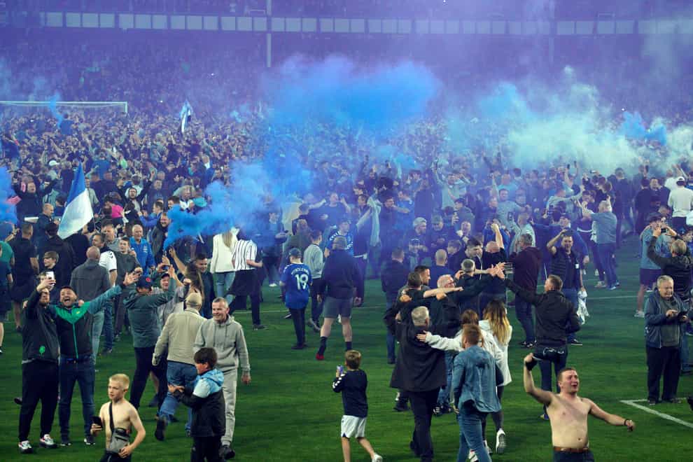 Everton fans invaded the Goodison Park pitch after Premier League safety was secured (Peter Byrne/PA)