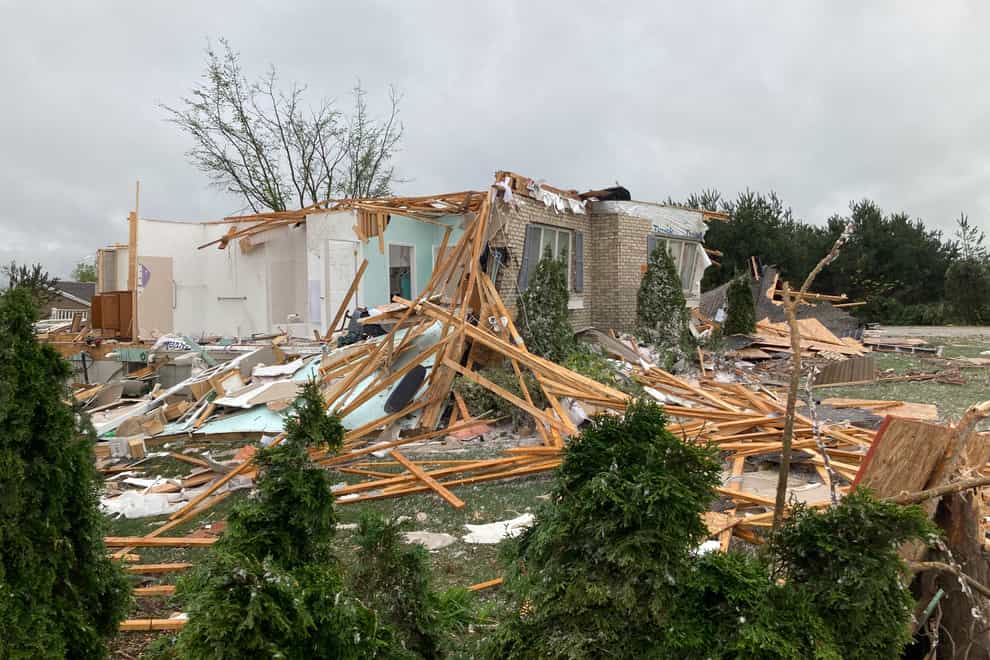 At least one person has been killed and more than 40 injured after a rare northern Michigan tornado battered a small town (John Flesher/AP)