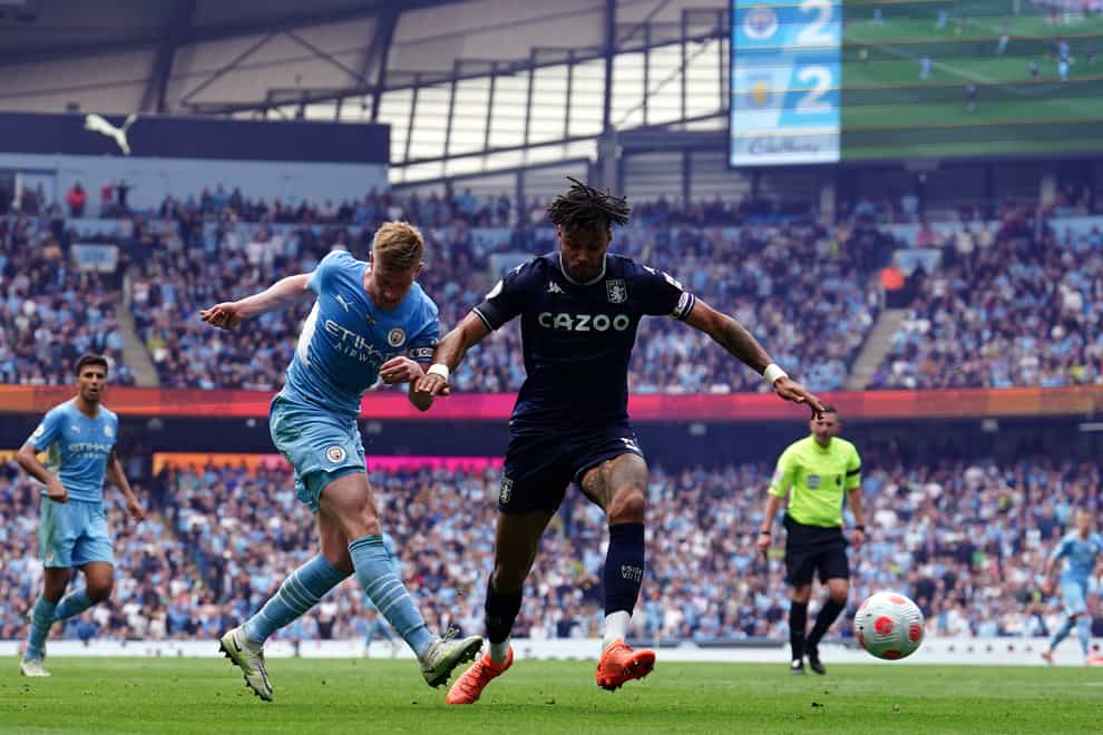 Kevin De Bruyne crosses the ball for substitute Ilkay Gundogan to score the winner in Man City’s title-clinching 3-2 comeback victory over Aston Villa (Martin Rickett/PA Images).
