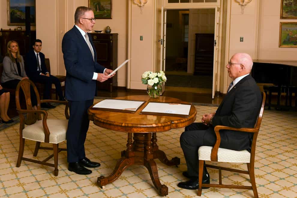 Australia’s new prime minister has been sworn into office ahead of a Tokyo summit with US President Joe Biden (Lukas Coch/AAP Image via AP)