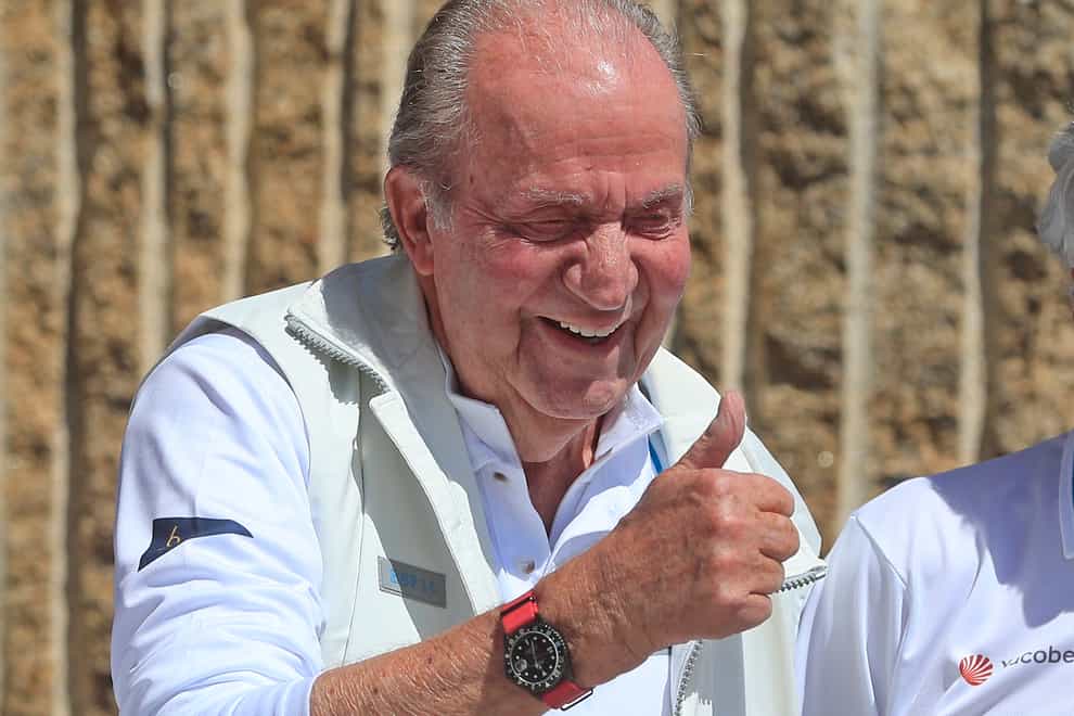 Spain’s former king Juan Carlos gives the thumbs up before a reception at a nautical club prior to a yachting event in Sanxenxo, north-west Spain (Lalo R. Villar/AP)
