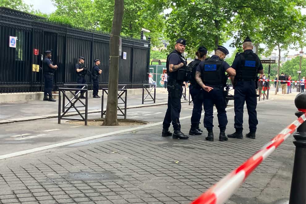 Police officers guard the entrance of the Qatar embassy on Monday May 23 2022 in Paris (Alexander Turnbull/AP)