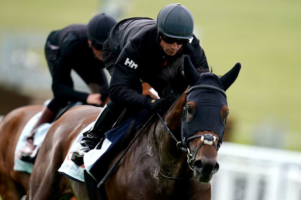 West Wind Blows ridden by Jack Mitchell during the gallops morning ahead of the Cazoo Derby 2022 at Epsom Racecourse, Surrey. Picture date: Monday May 23, 2022.