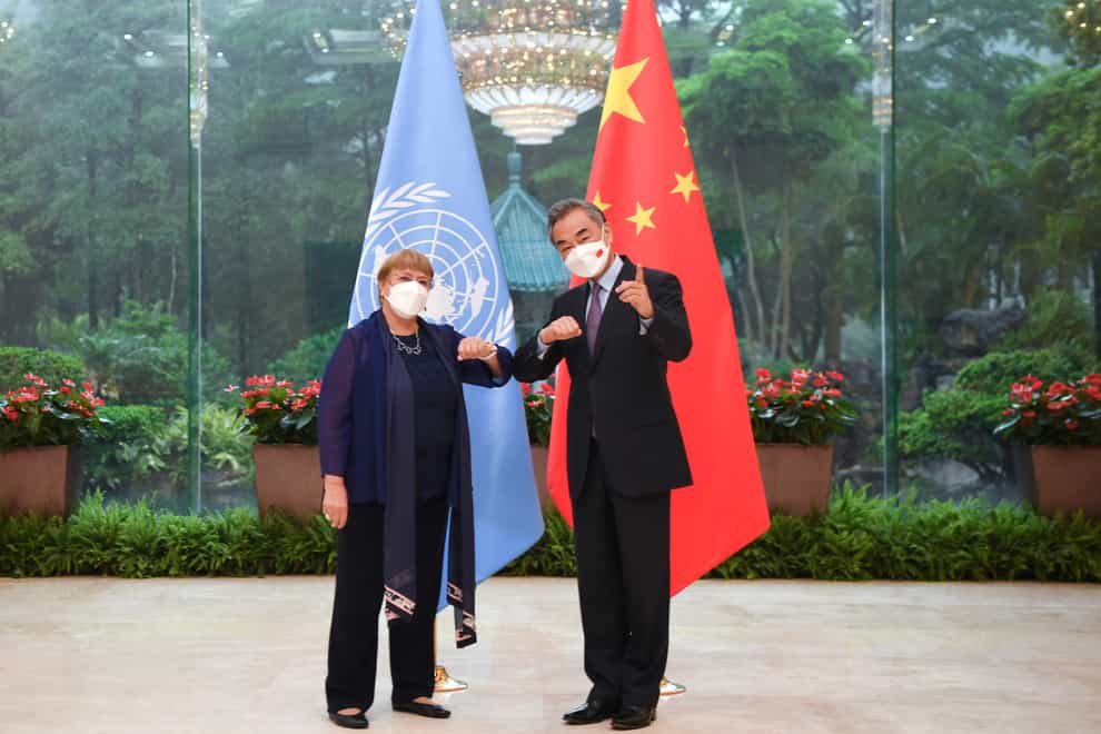 United Nations high commissioner for human rights Michelle Bachelet meets Chinese foreign minister Wang Yi (Xinhua via AP)