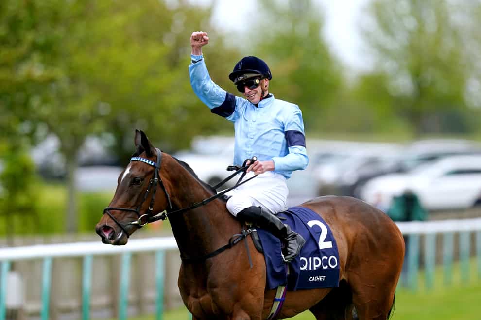 James Doyle and Cachet after winning the Qipco 1000 Guineas at Newmarket (David Davies/PA)