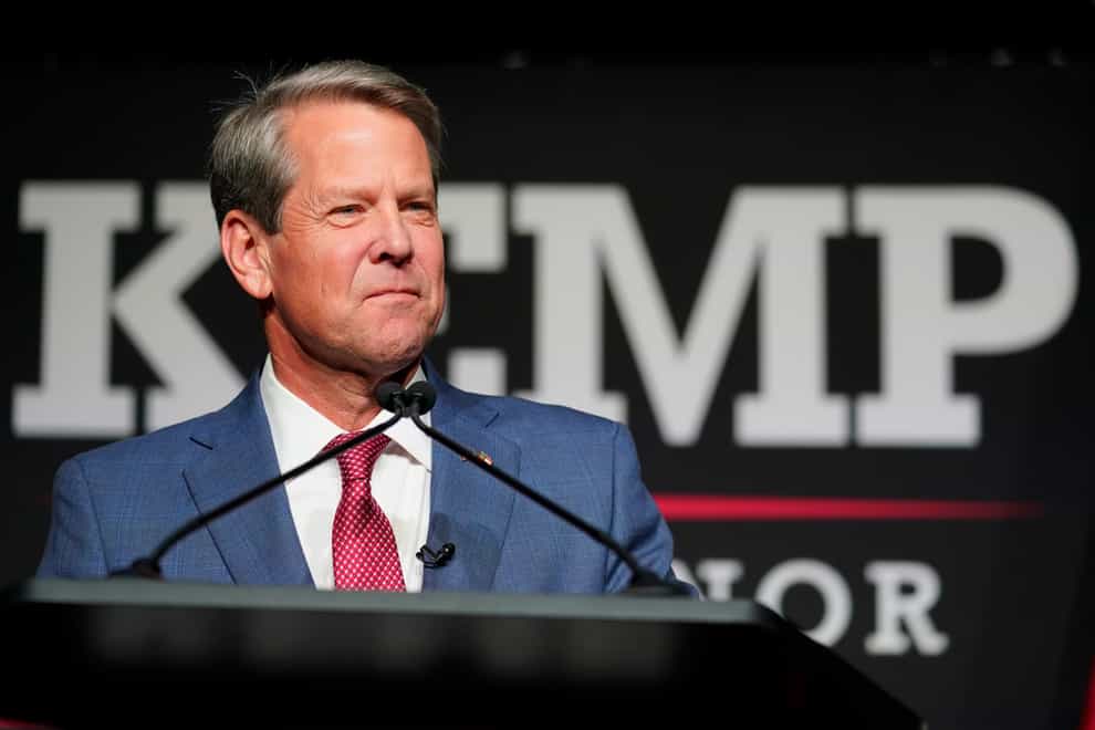 Republican governor Brian Kemp speaks to supporters (AP)
