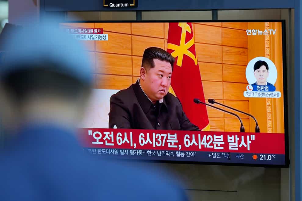 A TV screen in Seoul shows a news program reporting about North Korea’s missile launch with a file footage of North Korean leader Kim Jong Un (AP)