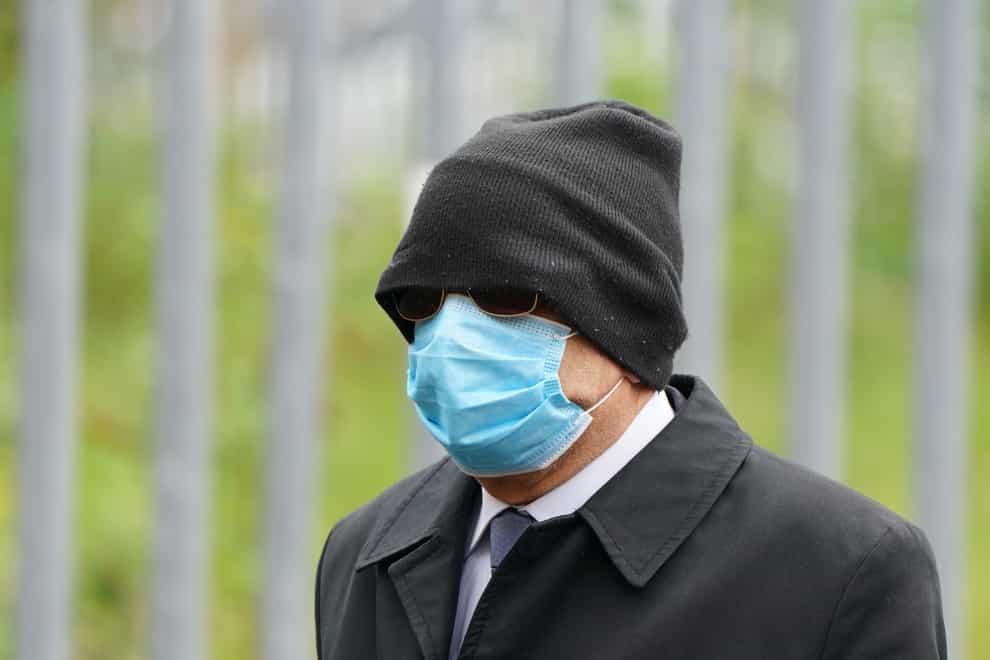 Former doctor Krishna Singh arrives at the High Court in Glasgow (Andrew Milligan/PA)
