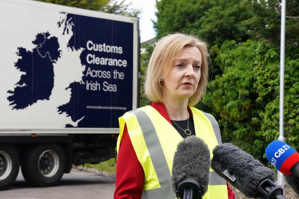 Foreign Secretary Liz Truss during a visit to McCulla Haulage, in Lisburn, Northern Ireland, to discuss the NI Protocol with businesses (Niall Carson/PA)