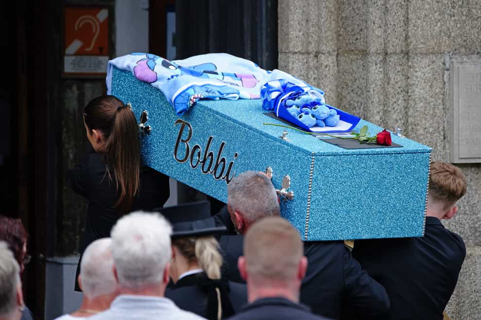 Bobbi-Anne McLeod’s coffin is carried into the Minster Church of St Andrew in Plymouth (Ben Birchall/PA)