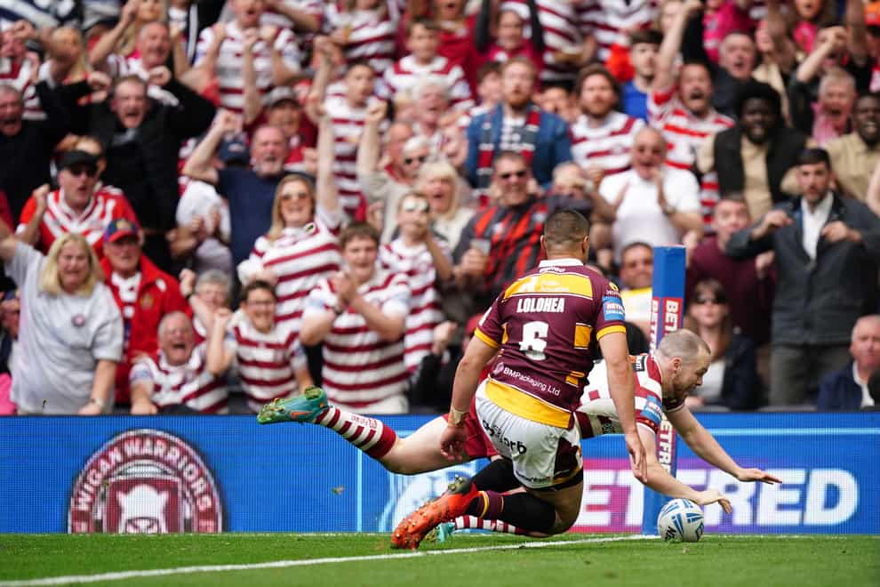 Wigan Warriors’ Liam Marshall scores a try during the Betfred Challenge Cup final at the Tottenham Hotspur Stadium Picture date: Saturday May 28, 2022.