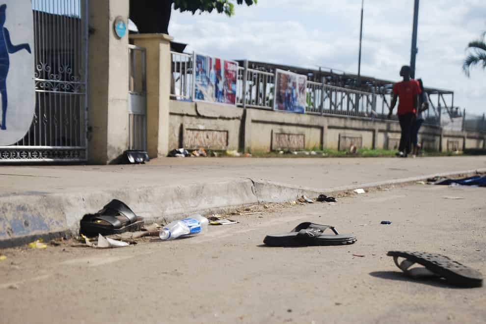 Sandals on the street after the fatal stampede (AP)