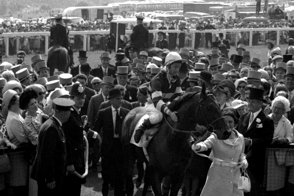 Sir Ivor are Lester Piggott are led in after winning the 1968 Derby (PA)