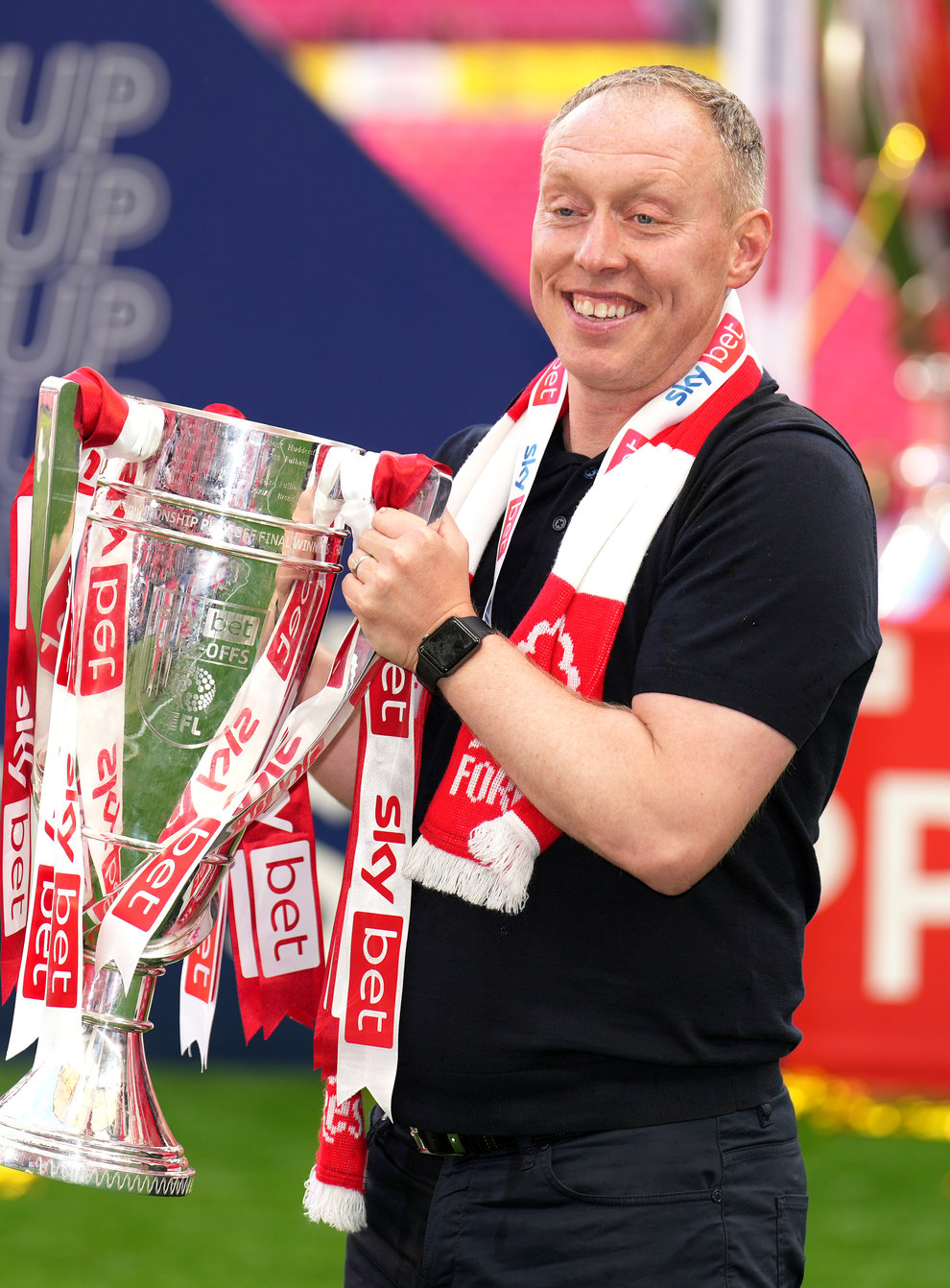 Nottingham Forest manager Steve Cooper celebrates with the trophy after victory in the Championship play-off final (John Walton/PA)
