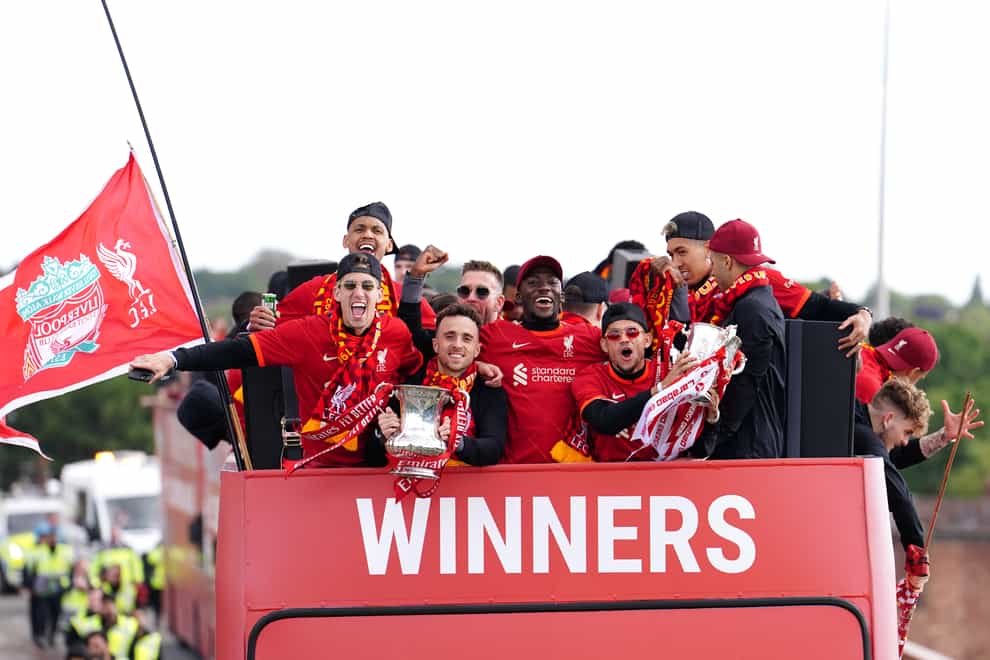 Liverpool celebrate their FA Cup and Carabao Cup double on a parade through the city (Martin Rickett/PA)