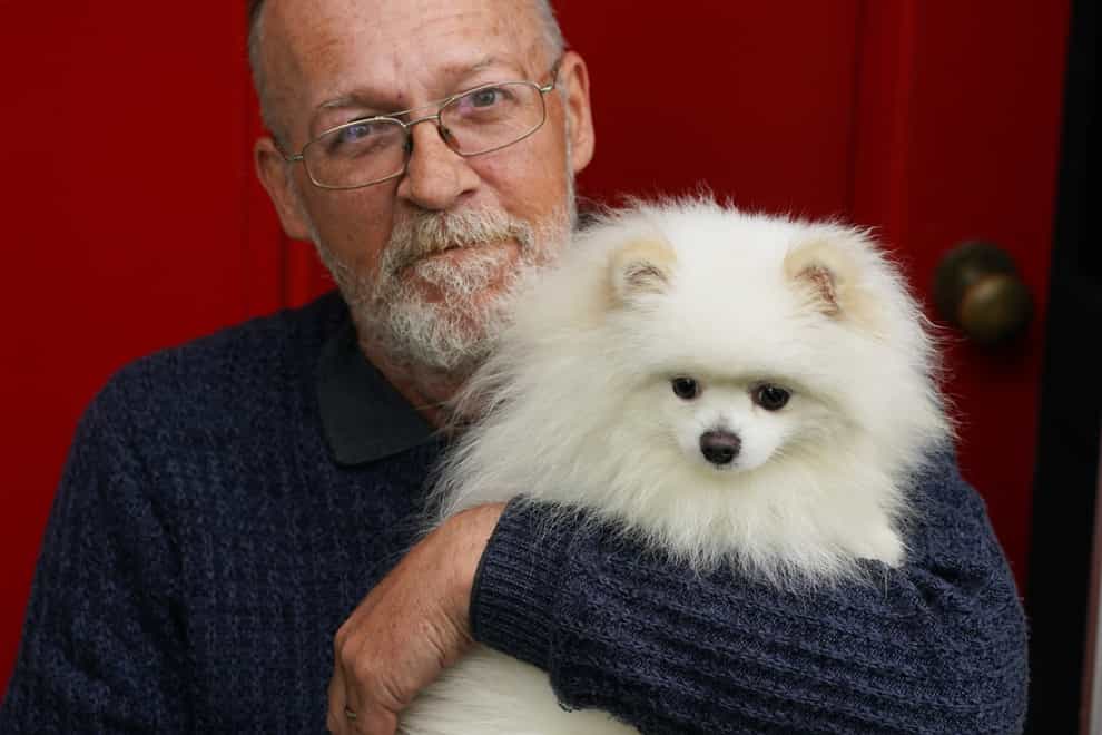 Mike Haley reunited with his one-year-old Pomeranian Archie (Owen Humphreys/PA)