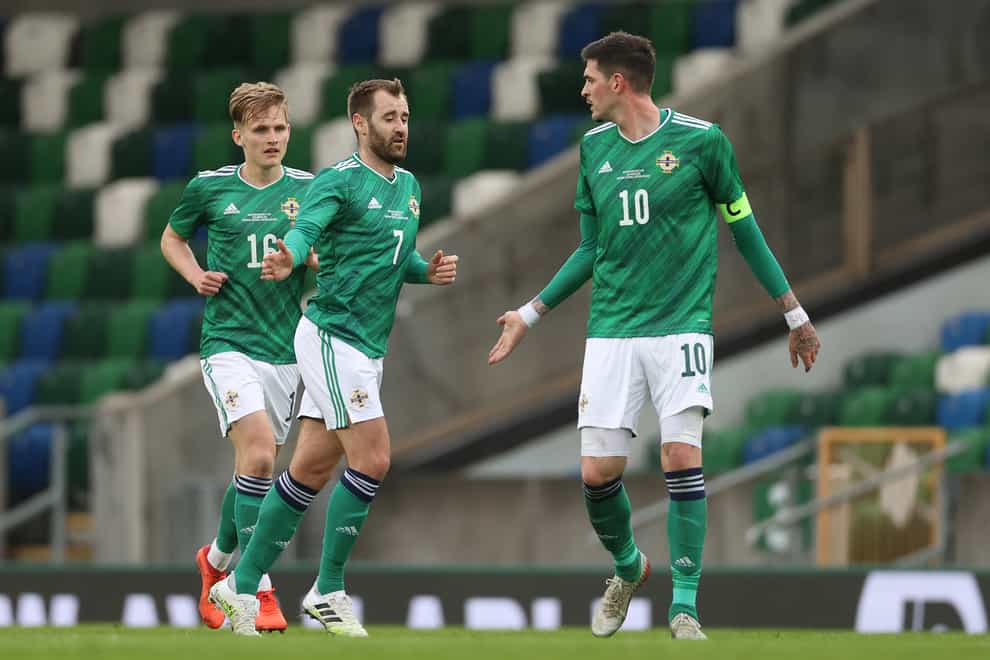 Niall McGinn, centre, believes Kyle Lafferty, right, can help solve Northern Ireland’s problems in front of goal (Liam McBurney/PA)