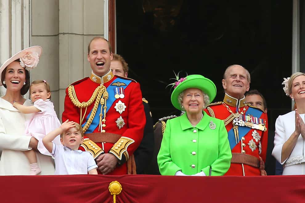 Queen Elizabeth II joining members of the royal family, including the Duke and Duchess of Cambridge with their children Princess Charlotte and Prince George, on the balcony of Buckingham Palace, central London after they attended the Trooping the Colour ceremony in 2016 (Steve Parsons/PA).
