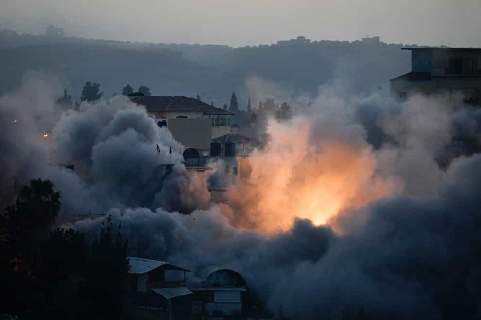 Israeli troops blow up the house of Palestinian militant Diaa Hamarsheh in the West Bank village of Yabed (AP)