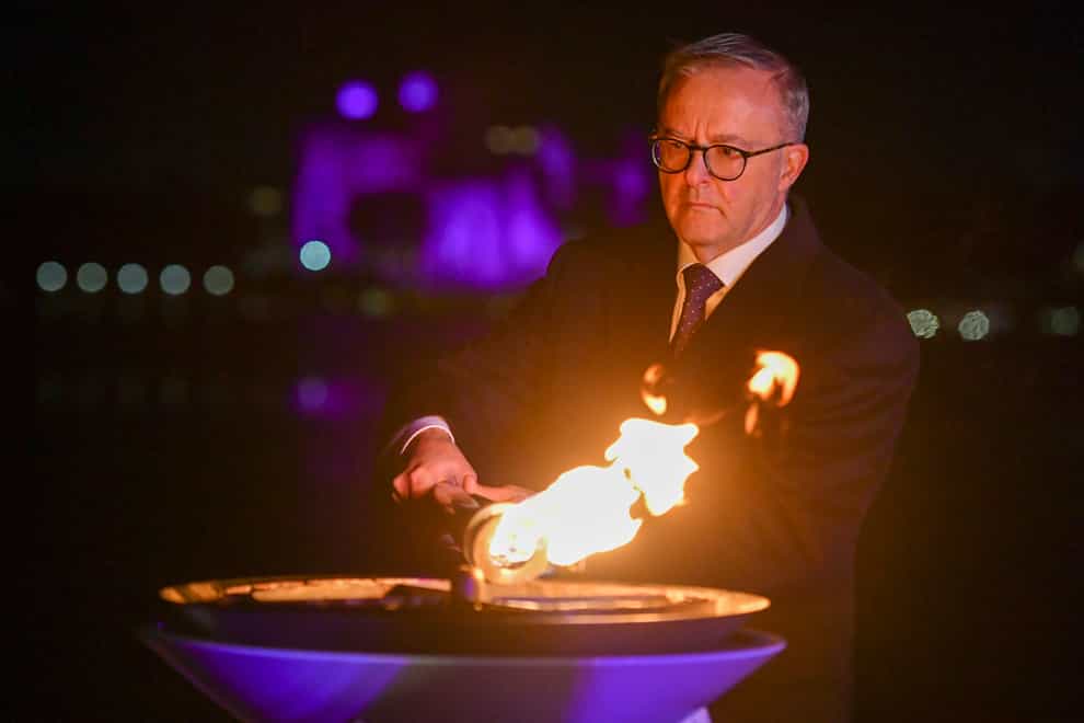 Australian Prime Minister Anthony Albanese lights the beacon (AAP Image via AP)