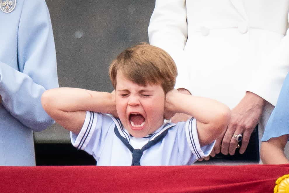 Prince Louis pulls a face on the balcony of Buckingham Palace (Aaron Chown/PA)