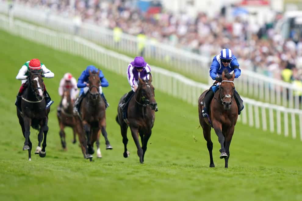 Hukum ridden by Jim Crowley (right) on their way to winning the Dahlbury Coronation Cup on Ladies Day during the Cazoo Derby Festival 2022 at Epsom Racecourse (Tim Goode/PA)