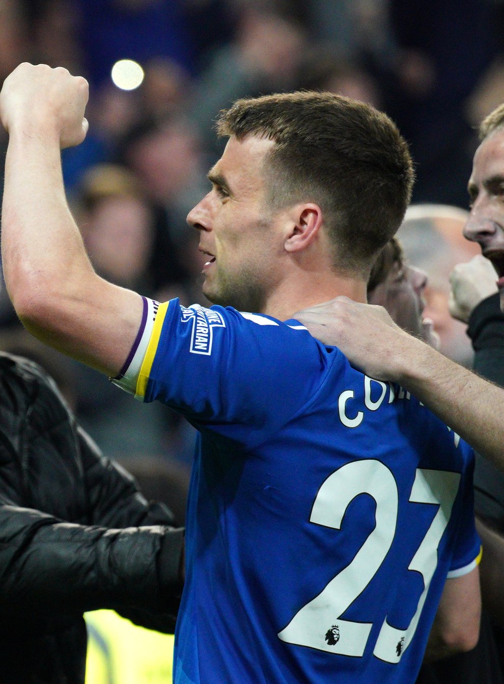 Fans mob Everton’s Seamus Coleman after the club secured their Premier League status (Peter Byrne/PA)