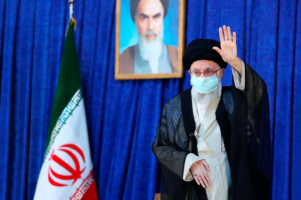 Supreme Leader Ayatollah Ali Khamenei waves to the crowd (Office of the Iranian Supreme Leader/AP)