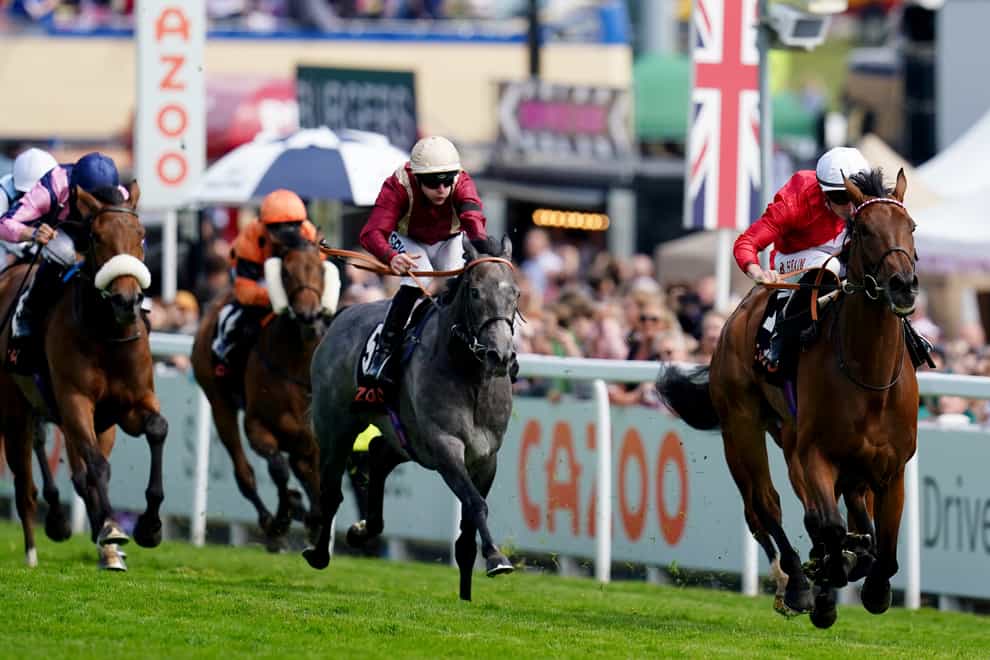 Bashkirova ridden by Tom Marquand (right) wins The Princess Elizabeth Stakes on Derby Day during the Cazoo Derby Festival 2022 at Epsom Racecourse (John Walton/PA)