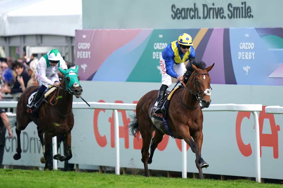 Desert Crown ridden by jockey Richard Kingscote wins the Cazoo Derby (In Memory of Lester Piggott) race on Derby Day during the Cazoo Derby Festival 2022 at Epsom Racecourse (Tim Goode/PA)