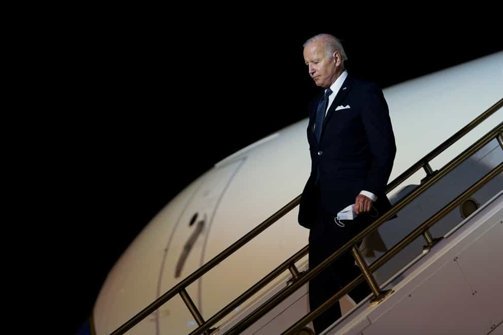 President Joe Biden walks down the steps of Air Force One (Susan Walsh/AP)