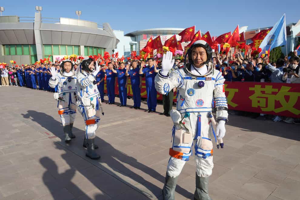 China has launched a new three-person mission to complete assembly work on its permanent orbiting space station (Li Gang/Xinhua/AP)